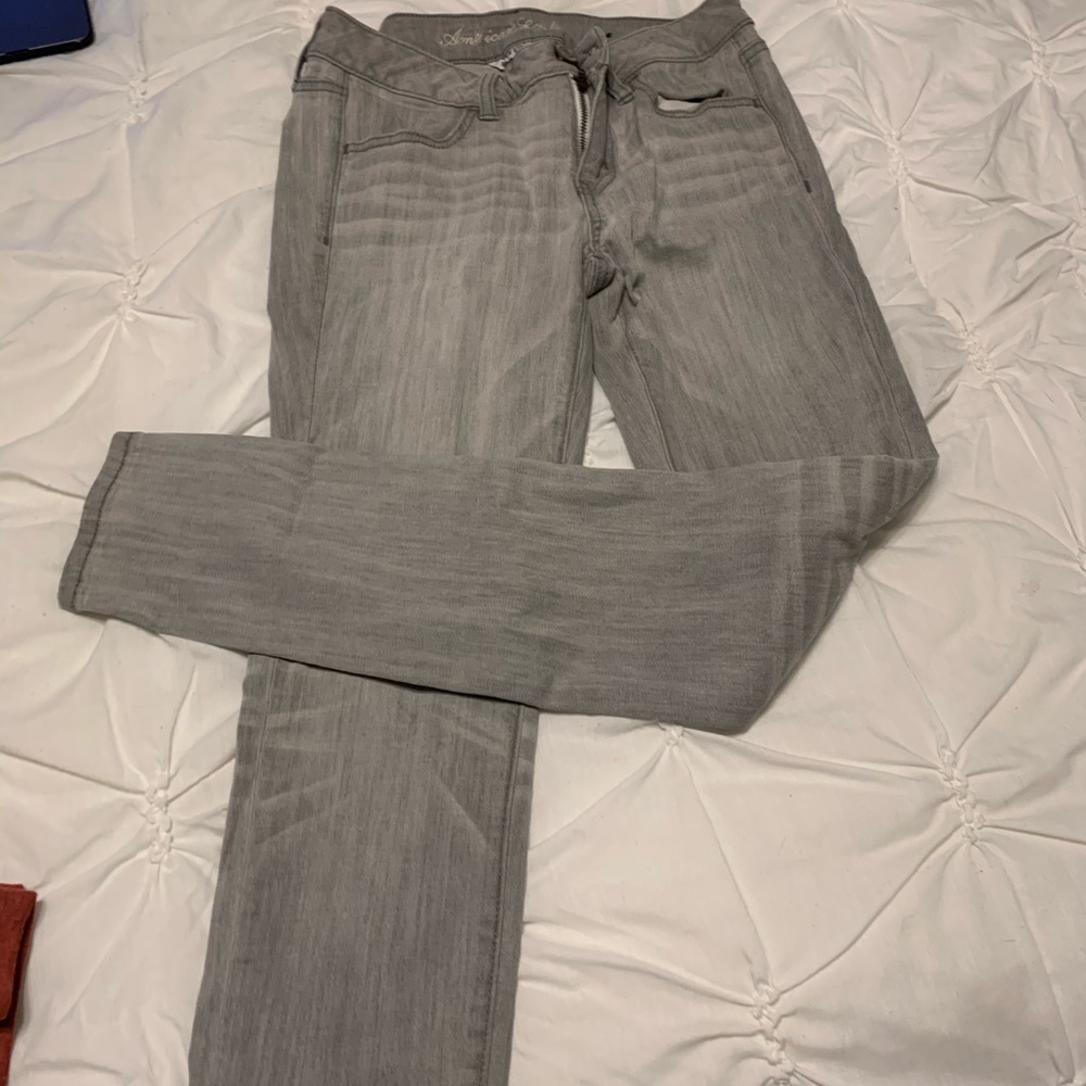 GREY AMERICAN EAGLE SKINNY JEANS